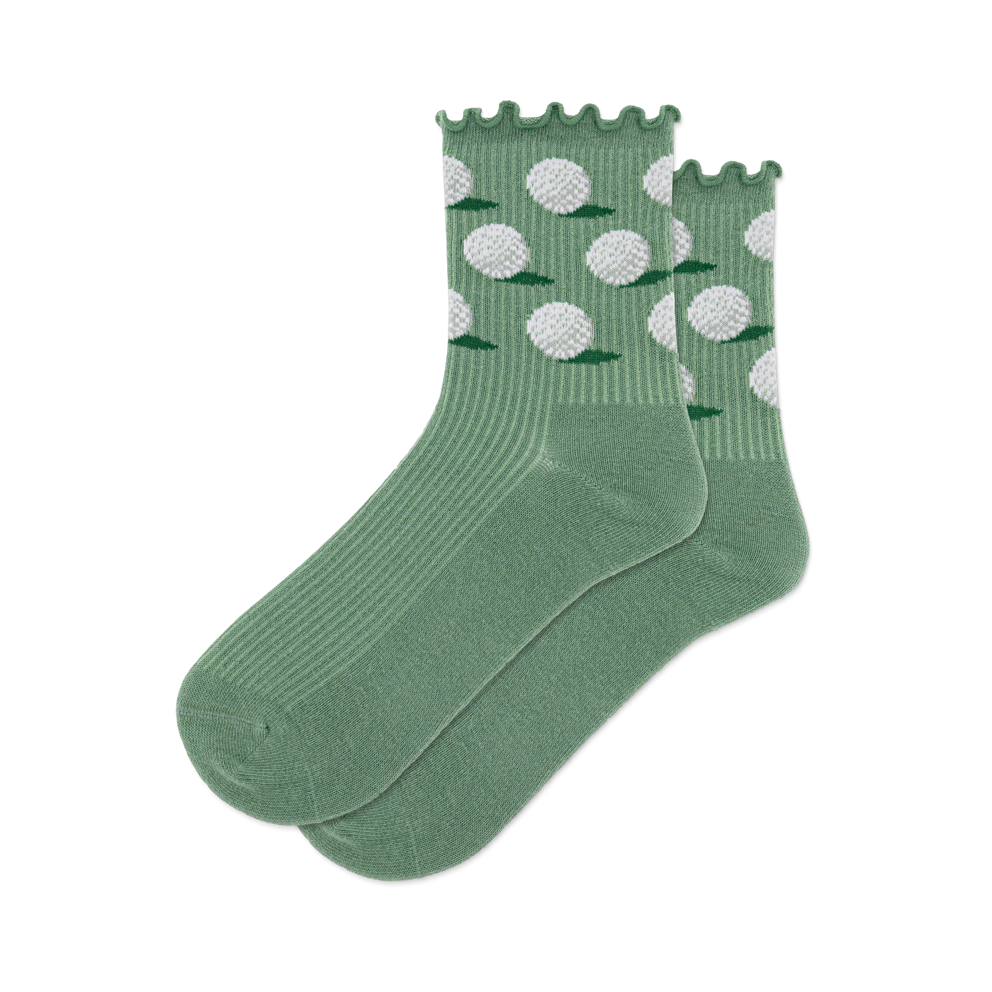 A pair of sage green crew socks with white dimpled golf balls and small green grass patches on the ankle, ribbed lower.