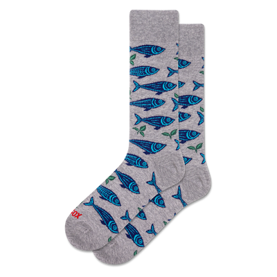 Pair of grey crew socks with an all-over pattern of blue sardines and small green leaves, displayed on a white background.
