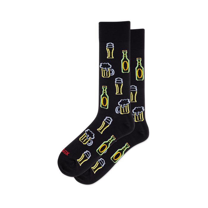 Black crew socks with a repeating pattern of white-outlined neon-style beer bottles, frothy mugs, and tall glasses in yellow and green. }}