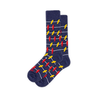 Dark blue crew socks covered in a pattern of red and yellow foosball players on horizontal grey bars with a white ball.
