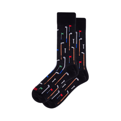 Pair of black crew socks with an all-over golf pattern. Features white, blue, brown golf clubs, white tees, and red/green/blue flags.