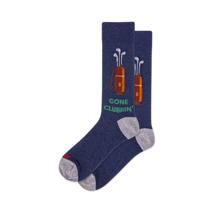 Two heather navy blue crew socks with grey heels/toes. Each features a brown golf bag with white clubs & green 'GONE CLUBBIN'' text. }}