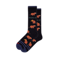 Pair of black crew socks with brown cartoon beavers, some holding yellow logs, and green "DAM IT" text.