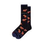Pair of black crew socks with brown cartoon beavers, some holding yellow logs, and green "DAM IT" text.
