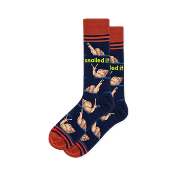 Navy crew socks with brown snails on blue trails, neon snailed it text, and rust orange striped cuffs and toes.