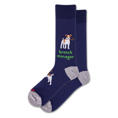Pair of navy crew socks. One sock features a white and brown dog holding a stick with "branch manager" text in green. Grey heel and toe.