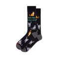 Pair of black crew socks with grey heel and toe. Features green text 'REAL MEN LOVE CATS' and an all-over pattern of grey and orange tabby cats.