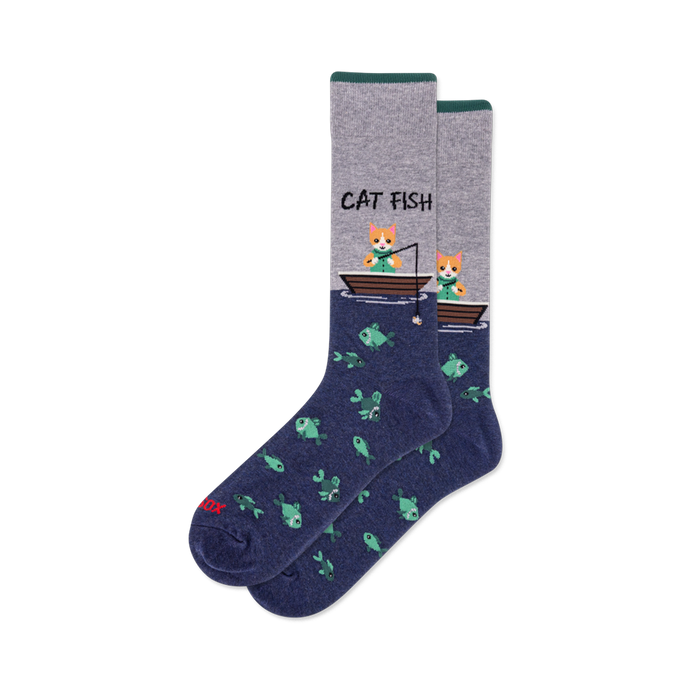 Crew socks with heather grey top, dark green cuff, and navy blue bottom. Design shows 