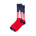 Crew socks featuring a white silhouette of the Statue of Liberty against a backdrop of navy blue with stars and red stripes.