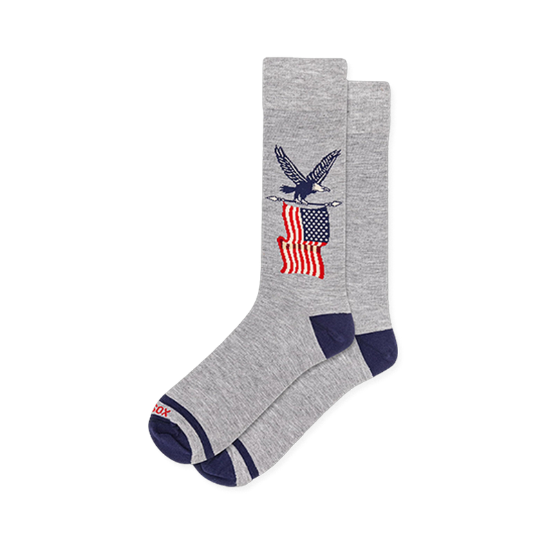 Heather grey crew socks with navy blue heel and toe, featuring a graphic of a bald eagle perched above an American flag.