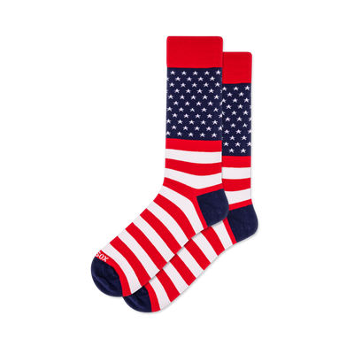 Pair of crew socks with an American flag design: red cuffs, blue field with white stars, and red and white stripes.