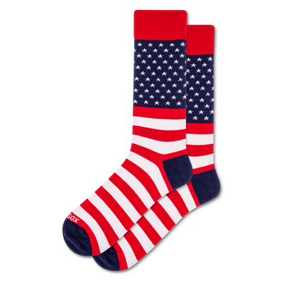 Pair of crew socks with an American flag design: red cuffs, blue field with white stars, and red and white stripes.