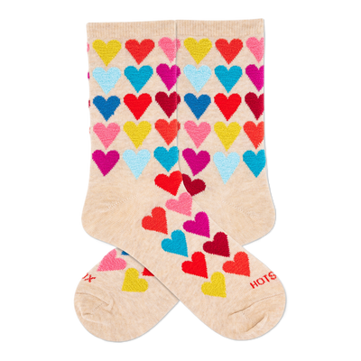 Two cream crew socks with a repeating pattern of colorful, fuzzy hearts in red, yellow, light blue, dark blue, magenta.