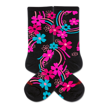 Pair of black crew socks with a vibrant rainbow floral pattern. Features hot pink, aqua, and outlined pink flowers and swirling lines.