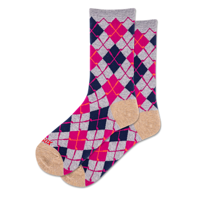 Pair of crew socks featuring a vibrant argyle pattern in navy blue, hot pink, light grey, and orange-red, with tan toes and heels.