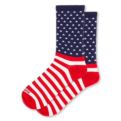 Crew socks with a US flag design. The leg is navy blue with white stars, and the foot features bold red and white stripes.