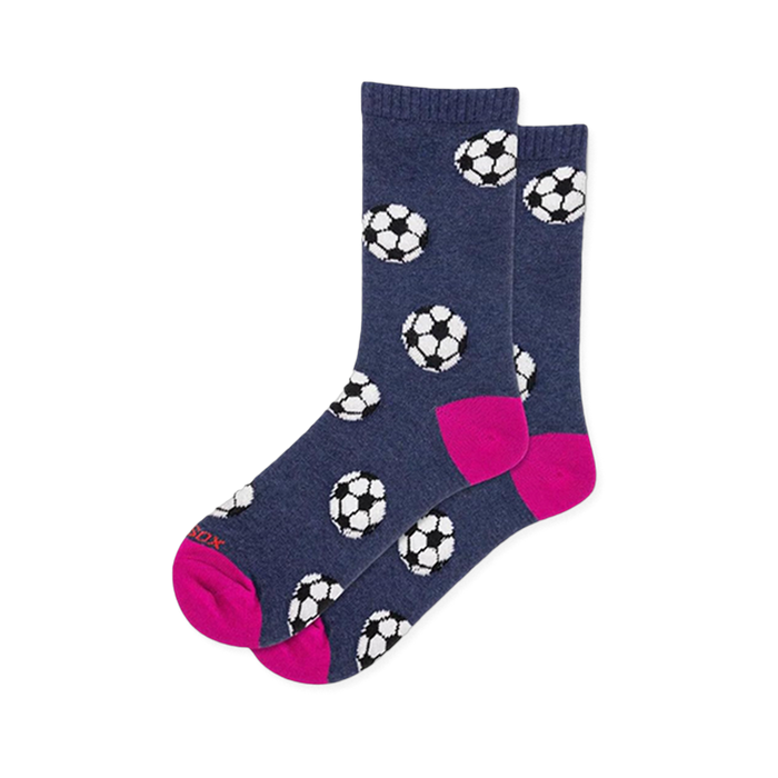 Heathered navy blue crew socks covered in black and white soccer balls with a bright hot pink heel and toe. }}
