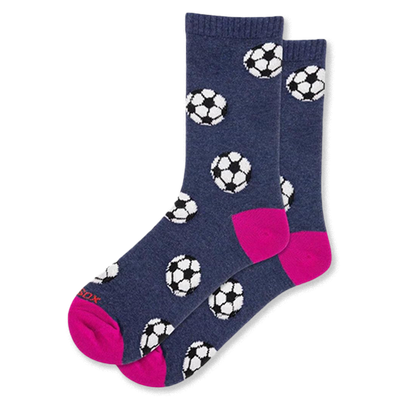 Heathered navy blue crew socks covered in black and white soccer balls with a bright hot pink heel and toe.
