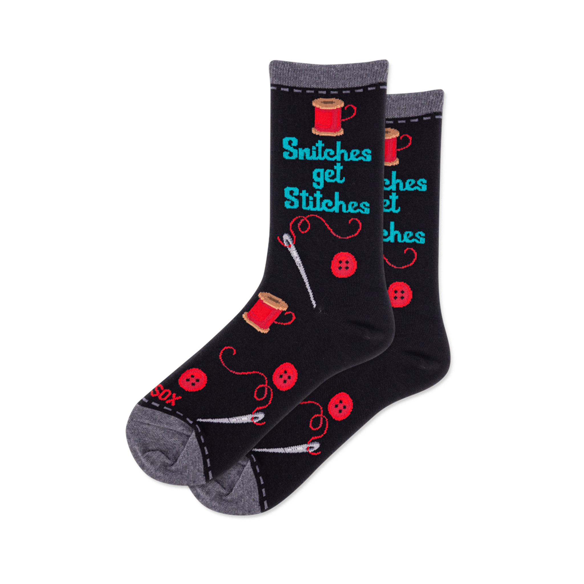 Pair of black crew socks featuring 'Snitches get Stitches' text, red thread spools, buttons, and white sewing needles.
