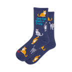 Two navy blue crew socks with a pattern of orange tabby and grey cats in various poses. One sock features text: 'One Cat Short of Crazy'.