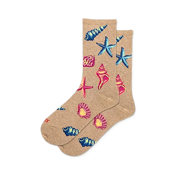 Light tan crew socks featuring a bright pattern of vivid blue starfish, neon pink sea shells, and colorful conches.