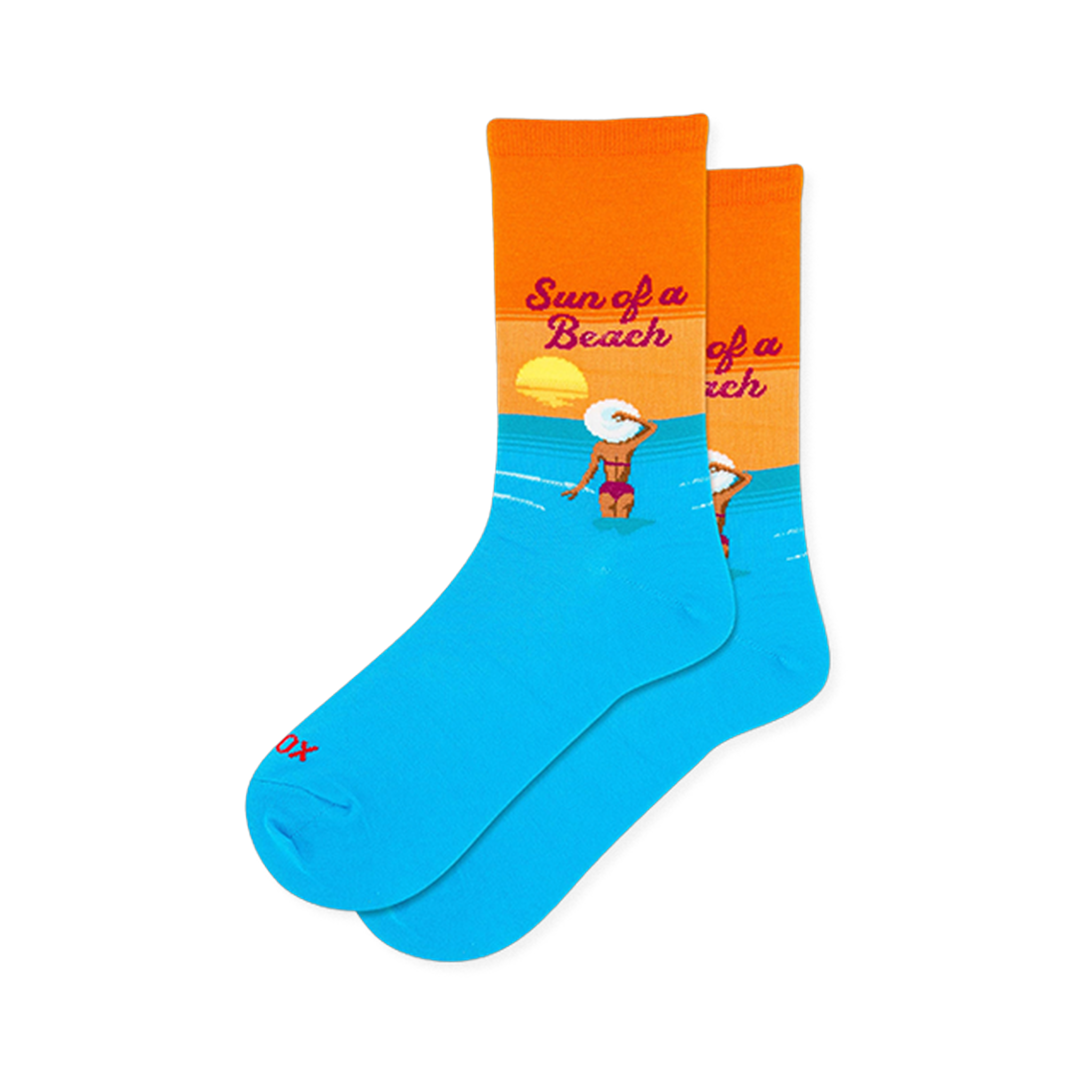 Bright blue and orange crew socks showing a woman in a pink bikini and white hat wading in the water below a setting sun.