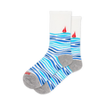 White crew socks featuring wavy light and dark blue stripes on the foot and a red sailboat on the calf, with a grey heel.
