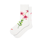 White crew socks featuring a large pink and red lily floral graphic with a long green stem stretching down the side.