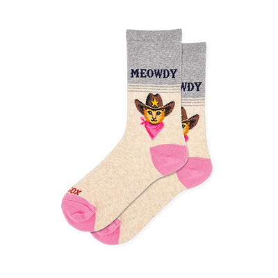 Heathered gray and cream crew socks featuring the word MEOWDY, pink heels and toes, and an orange cat wearing a cowboy hat.