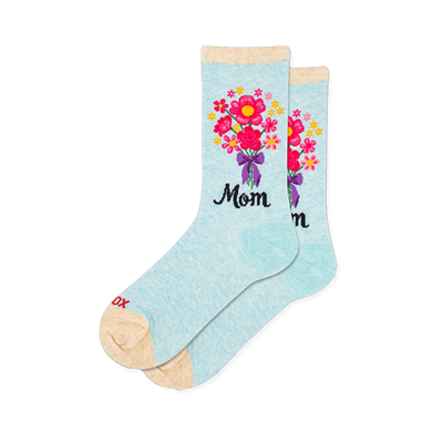 Light blue heathered socks with a pink and yellow floral bouquet tied with a purple bow above the word Mom in black script.