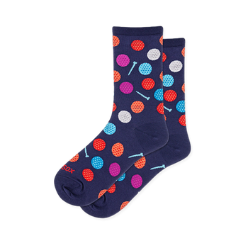 Navy blue crew socks covered in bright colorful dimpled golf balls in pink, red, orange, white, and blue, with small tees.