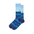 Light blue crew socks featuring dark blue rolling ocean waves on the bottom half and a small orange sailboat on the horizon.