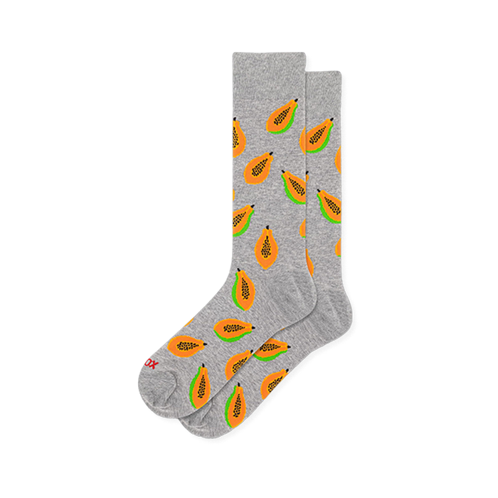 Light grey crew socks with a repeating pattern of sliced papayas showing bright orange flesh and black seeds. }}