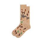 Tan crew socks featuring a western pattern of brown horses, cowboy boots, hats, green cacti, and text Talk Rodeo To Me.