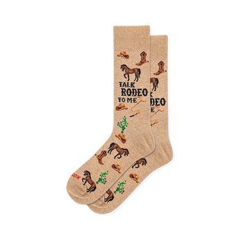 Tan crew socks featuring a western pattern of brown horses, cowboy boots, hats, green cacti, and text Talk Rodeo To Me.