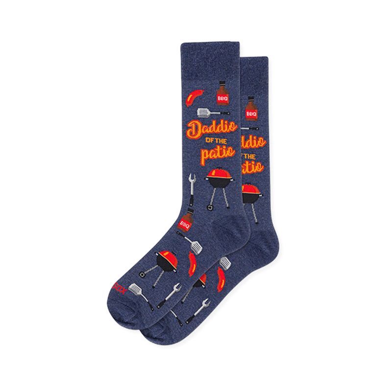 Navy crew socks with red charcoal grills, BBQ sauce, spatulas, hot dogs, and orange Daddio of the patio text.