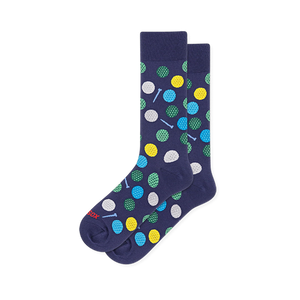Navy blue crew socks covered in dimpled golf balls in white, yellow, green and blue, with small light blue golf tees.