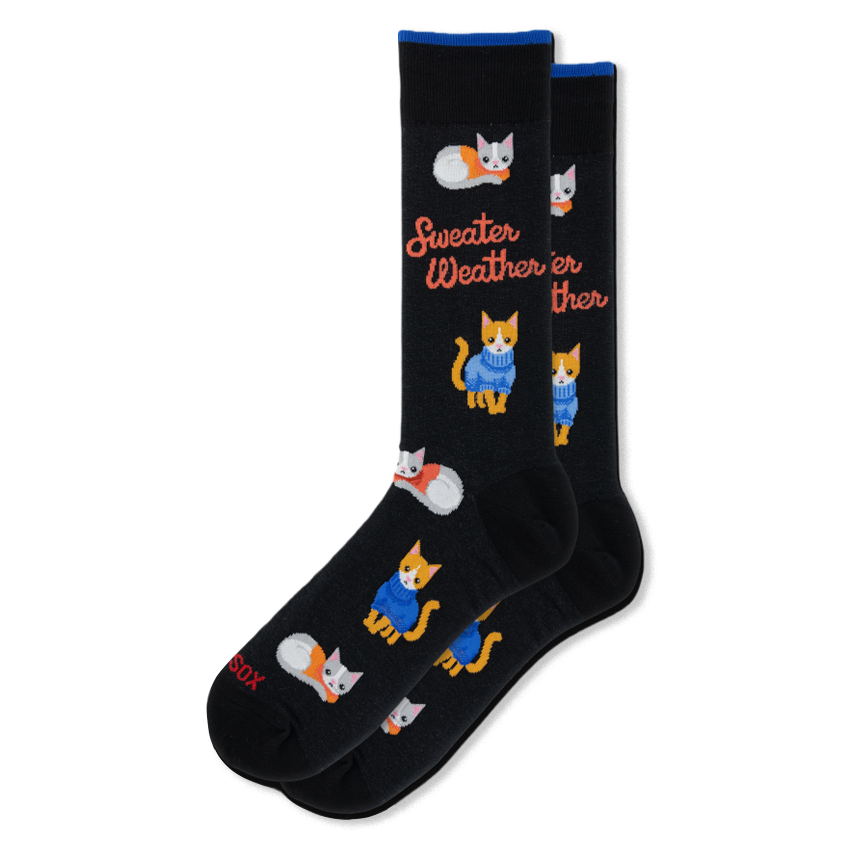 Black crew socks showing orange and grey cats wearing blue and orange sweaters, with cursive Sweater Weather text.