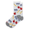 White socks with blue lined paper pattern showing red apples, yellow pencils, and blue eyeglasses. Gray heels and toes.