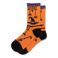 Orange crew socks with black witch hats, spiderwebs, dangling purple spiders, and broomsticks. Purple cuff and black toes.