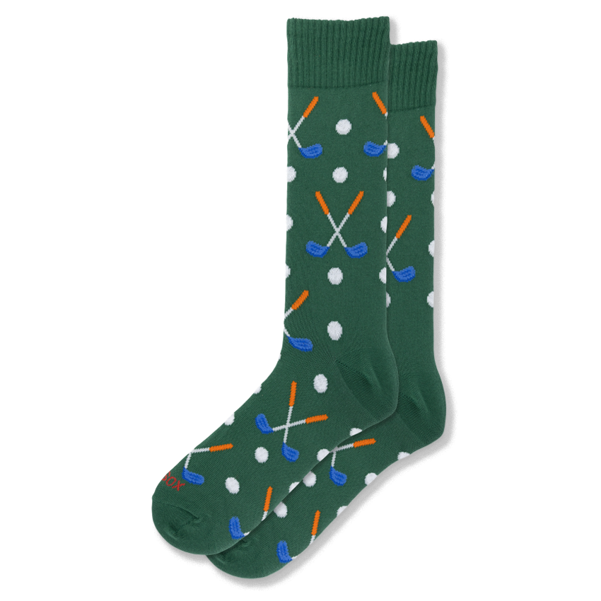 Forest green crew socks displaying a pattern of white golf balls and crossed golf clubs with orange handles and blue heads.