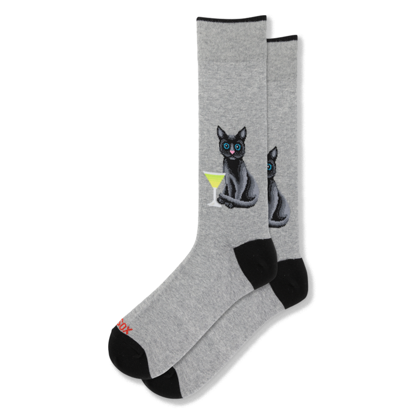 Light grey crew socks with a black cat sitting by a green martini glass, finished with a black toe and heel.