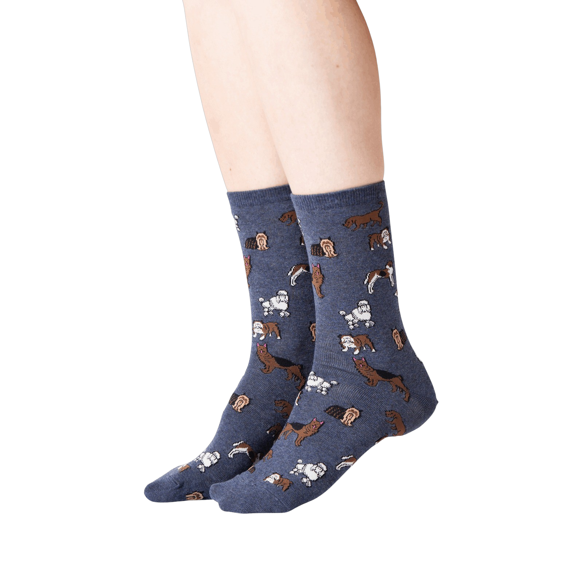 Lifestyle shot of woman's legs wearing navy blue crew socks with dogs on them.