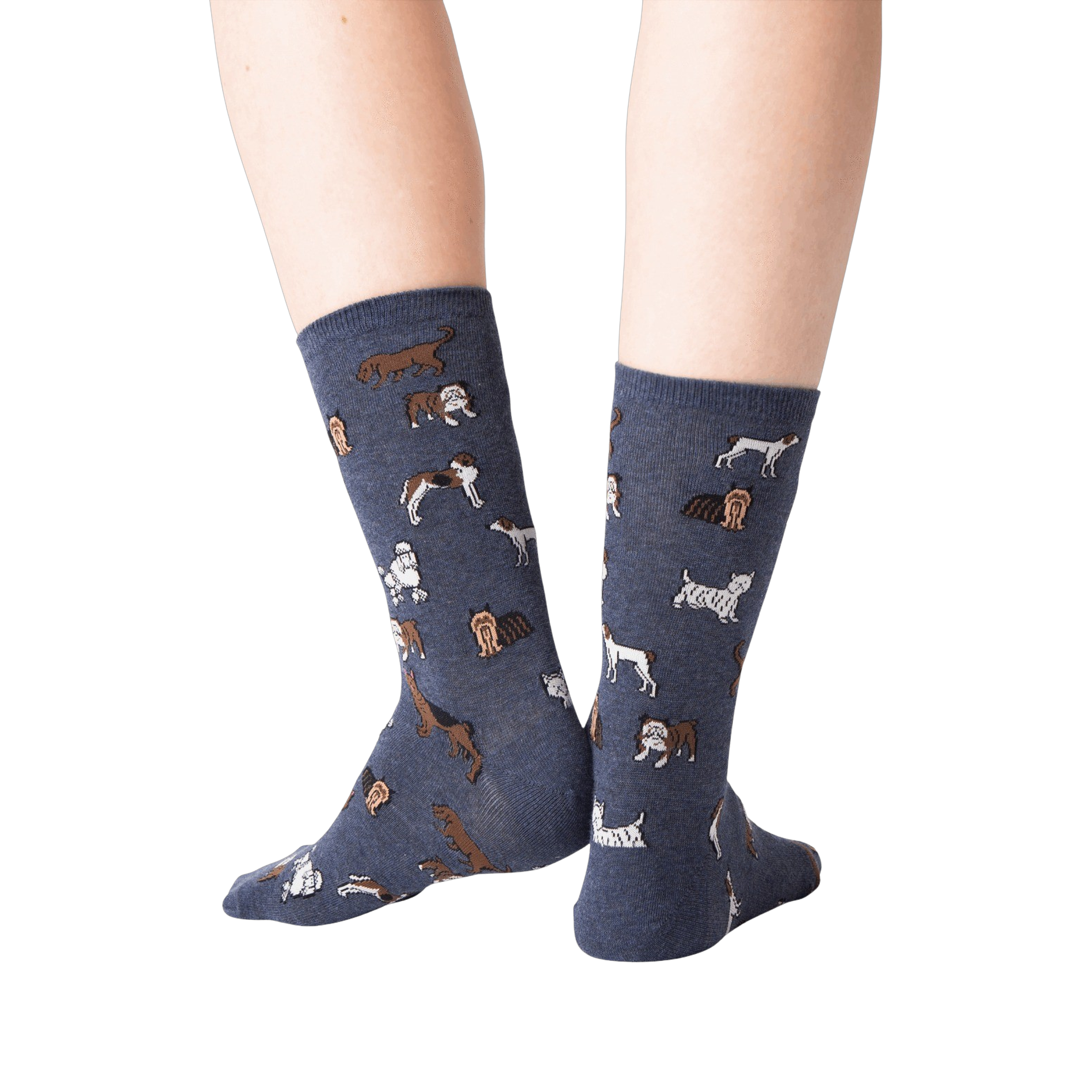 Back view lifestyle shot of woman's legs wearing navy blue crew socks with dogs on them.