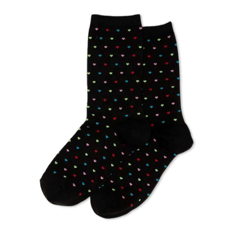 Pair of black crew socks with a repeating pattern of small, colorful pindot hearts in red, green, blue, and pink.