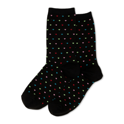 Pair of black crew socks with a repeating pattern of small, colorful pindot hearts in red, green, blue, and pink.