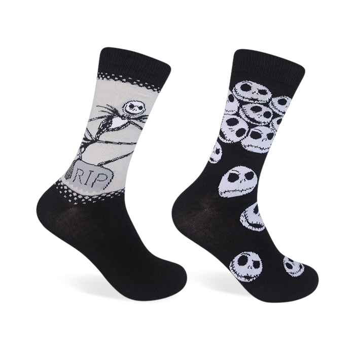 Two crew socks. One sock features Jack Skellington and a tombstone; the other has a repeated pattern of Jack's skull. Both are black and white. }}