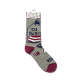 Lifestyle shot showing one 'Go Away! I'm Reading' sock on a foot, showcasing how the socks look when worn.