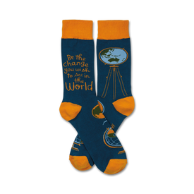crew length blue socks with orange toes, heels and cuffs. feature globes with the text 'be the change you wish to see in the world.' men's and women's inspirational socks.  