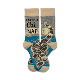 cat nap crew socks with â€œi need a cat napâ€ in large black text on blue background, cartoon cat sleeping on book  